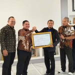Perwakilan BPJS Ketenagakerjaan bersama dengan PT Rejoso Manis Indo.