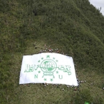 Bendera Raksasa NU di Lereng Gunung Panderman Kota Batu Pecahkan Rekor MURI.