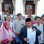 Sekjen BAGUSS, Yusub Hidayat saat memberikan keterangan pers di Mapolrestabes Surabaya