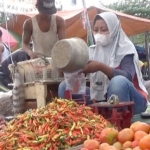 Pedagang cabe rawit merah di Pasar Raya Mojoagung.