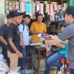 Sosialisasi Pilkada saat kirab maskot Pilkada 2024 berakhir di Pasar Tulangan, Rabu (9/10/2024). foto ist