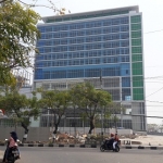 Gedung Apartemen dan Icon Mall, salah satu sarana perekonomian baru di Kabupaten Gresik. foto: SYUHUD/ BANGSAONLINE