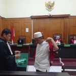 Terdakwa Moch.Faizal Rozaq bin Karminto 
