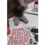 Barang bukti berupa uang palsu yang diamankan petugas dari Polres Blitar Kota.