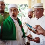 Habib Khusen Bin Muhdor Al Muhdor (sorban hijau). Foto: HADI PRAYITNO/BANGSAONLINE