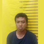 Mujib Ridwan (35),  pelaku pencopetan di Surabaya Expo Center saat diamankan Polsek Tambaksari. 