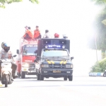 Penyemprotan cairan disinfektan di Jalan Protokol Jombang. foto: AAN AMRULLOH/ BANGSAONLINE