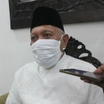Pengasuh Ponpes Tebuireng, K.H. Abdul Hakim Mahfudz (Gus Kikin)­.