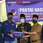 Gus Barra bersama Ketua Nasdem Kabupaten Mojokerto serta Danramil Kutorejo dan Pengurus Pondok Al Hidayah. (foto: ist)