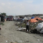 Kondisi TPA Ngipik milik PT. SI yang dipinjam Pemkab Gresik untuk penampungan sampah. foto: SYUHUD/ BANGSAONLINE