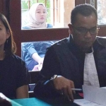 Korban saat mengikuti sidang dengan agenda tuntutan.