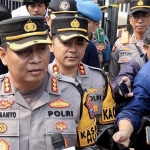 Kabid Humas Polda Jatim Kombes Pol Dirmanto saat memberikan keterangan terkait penyekatan tahun baru.