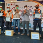 Para relawan dari Kabupaten Pamekasan menjadi tim terbaik dalam Rakornis dan Jambore Relawan di Obi Camp Trawas, Mojokerto.