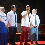 Wali Kota Pasuruan, Saifullah Yusuf, didampingi sang istri, bersama Wakil Wali Kota Pasuruan, Adi Wibowo, beserta istrinya ketika menghadiri Pass Harmoni.