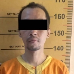 Tersangka, FQ (34) warga Tuban, yang diduga menggelapkan dana umrah dan merugikan hingga ratusan juta rupiah. Foto: Ist.