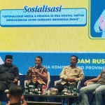 Adam Rusydi paparan saat sosialisasi bertajuk "Optimalisasi Media dan Pemuda di Era Digital untuk Mewujudkan Jawa Timur Gerbang Indonesia Emas", di Hotel Aston Sidoarjo, Jumat (26/9/2025). Foto: Ist.