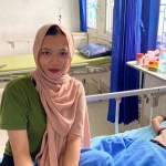 Alifia Zumrotul Nisa (21), seorang mahasiswa yang menjadi peserta JKN dari Kecamatan Kandat, Kabupaten Kediri.