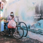 Salah satu sudut di Kelurahan Kampung Dalem berhiaskan mural bertema kebudayaan. Jamu, es puter, dan rujak buah menjadi komoditi unggulan di Kampung Dalem. foto: ist.