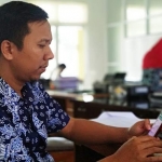 Kasubag Tata Pemerintahan Bagian Administrasi Pemerintahan dan Kerja Sama Setkab Pacitan Hendri Mujianto.  foto: YUNIARDI SUTONDO/ BANGSAONLINE