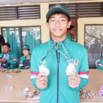 Akhmad Javier Hamid, siswa SMPN 2 Bangkalan peraih 2 perak di Porpov Jatim 2023.