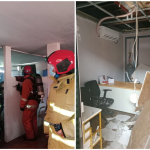 Petugas Damkar saat melakukan pembasahan usai memadamkan titik api di ruang arsip Gedung Satnarkoba Polres Pelabuhan Tanjung Perak
