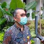 Kepala Dinas Kependudukan dan Pencatatan Sipil (Kadispendukcapil) Kota Surabaya Agus Imam Sonhaji. (foto: ist)