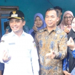 Menteri Kemendukbangga/BKKBN bersama Wali Kota Pasuruan saat launching pelayanan KB serentak di tempat kerja.