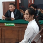 Terdakwa arfita saat menjalani persidangan
