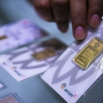 Harga emas antam per hari ini mengalami kenaikan tipis. Foto: Ist.