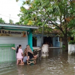 Banjir di Dusun Beluk, Desa Jombok, Kecamatan Kesamben, Jombang.