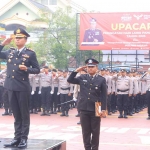 Kapolres Ngawi AKBP Charles Pandapotan Tampubolon saat memimpin upacara peringatan Hari Lahir Pancasila.