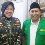 Abdul Holil, S.Hum., M.I.Kom, Sekretaris GP Ansor Kota Surabaya saat bersama Tri Rismaharini. foto: istimewa