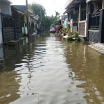 Banjir luapan Kali Lamong merendam Desa Mojotengah Kecamatan Menganti. 