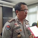 Kabid Humas Polda Jatim Kombes Pol Barung Mangera saat dimintai keterangan.