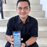 Salah satu peserta JKN dari segmen PPU atau Pekerja Penerima Upah, Hikam Putra.