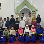 Santunan anak yatim yang digelar Laskar Kamil.