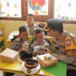 Kegiatan berbagi Makan Bergizi Gratis oleh Polres Tuban (dok. Humas Polres Tuban)