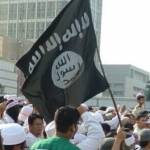 Bendera ISIS berkibar diantara pendemo di Bundaran HI Jakarta. Foto: merdeka.com 