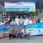 Panitia Amal Bakti saat foto bersama usai kegiatan.