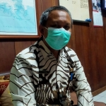 Kepala Dinas Kesehatan, Pengendalian Penduduk, dan Keluarga Berencana Kabupaten Trenggalek, Saeroni. Foto: HERMAN SUBAGYO/ BANGSAONLINE