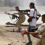 ?Tentara setia kepada Pemerintah (GNA) saat berlatih, di selatan Tripoli. Foto: AFP via Getty Images