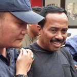 M Samanhudi Anwar saat digelandang aparat kepolisian dari Polda Jatim, Jumat (27/1/2023). Foto: istimewa