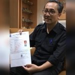 Kepala Dispendukcapil Kota Surabaya Agus Imam Sonhaji.