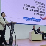 Wamenko Hukum, HAM, Imigrasi dan Pemasyarakatan saat memberi sambutan.