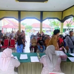 Penyerahan 239 sertifikat tanah ke warga di Desa Kedemungan, Kecamatan Kejayan, Kabupaten Pasuruan.