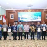 Sosialisasi Pengadministrasian dan Pendaftaran Tanah Ulayat di Kantor Gubernur Kalimantan Selatan.