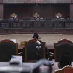 Suasana sidang Mahkamah Konstitusi saat pembacaan amar putusan Perkara Nomor 62/PUU-XXII/2024, Kamis (2/1/2025). Foto Humas/Bayu

