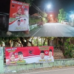 APK bergambar pasangan Yani-Alif dan Risma-Gus Hans yang dipasang PDIP Gresik. FOTO: ist.