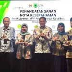 Jajaran BPJS Kesehatan Cabang Malang bersama dengan Pemkot Batu.