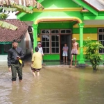 Banjir yang melanda Desa Sukorejo Kecamatan Kunir Lumajang. Ketinggiannya mencapai hingga 40 centimeter.